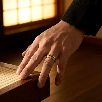 Gold metal ring with a black stripe Japanese Melody